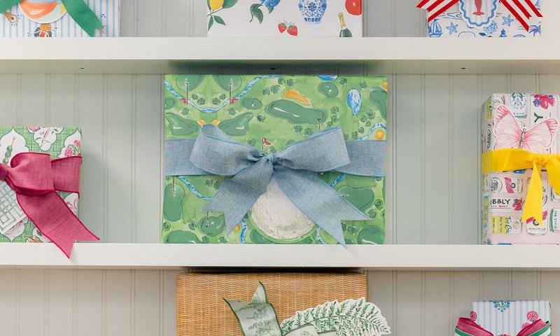 Wrapped gifts and ribbon bows on the shop shelves